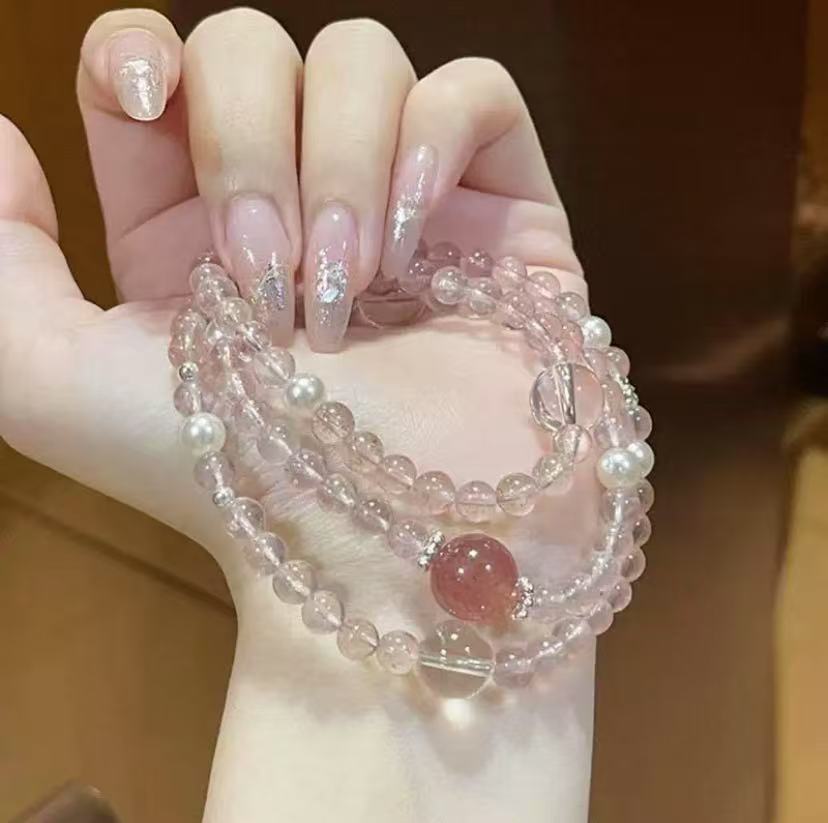 Strawberry crystal layered bracelet with three rings