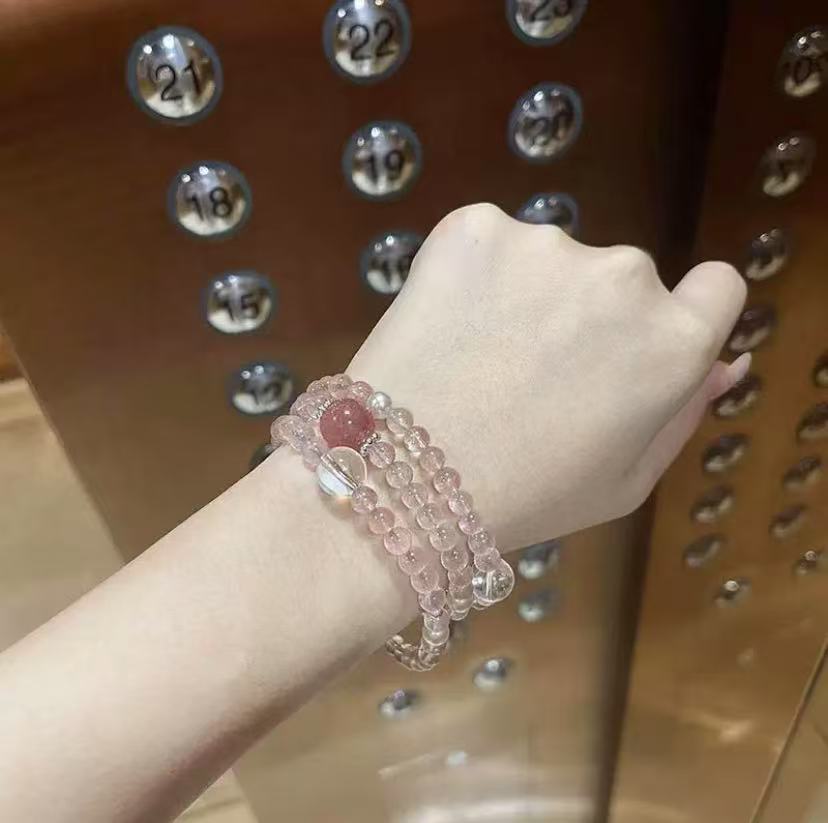 Strawberry crystal layered bracelet with three rings